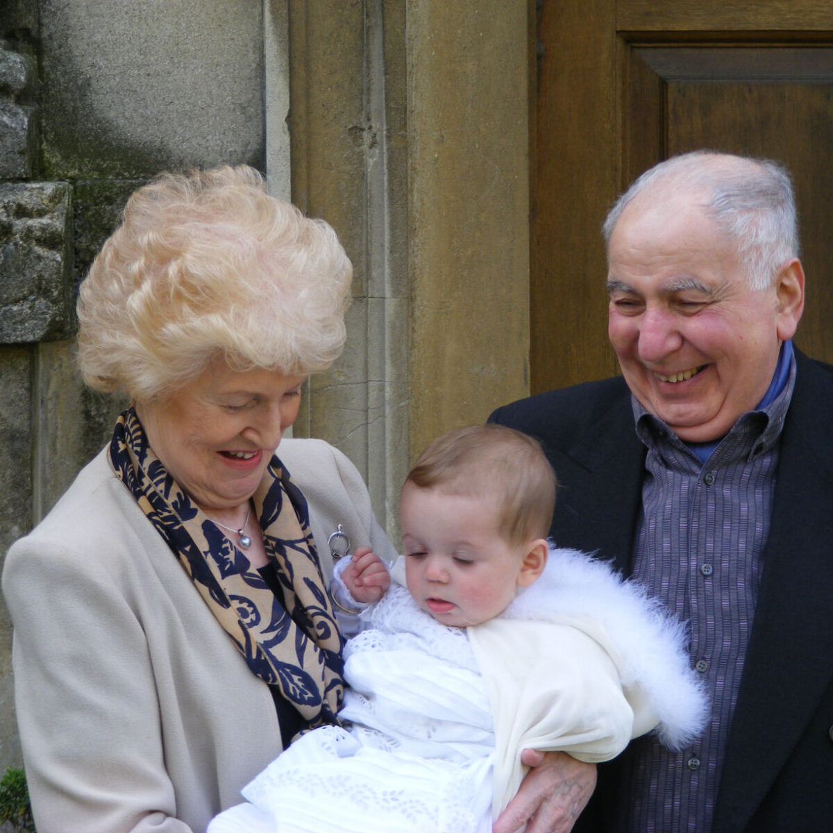 Bibi and Taid with baby Estella at her christening