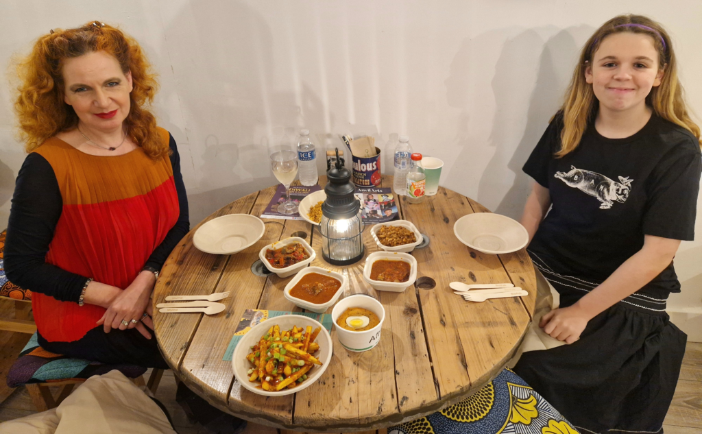 Emily and Estella with a yummy spread of food
