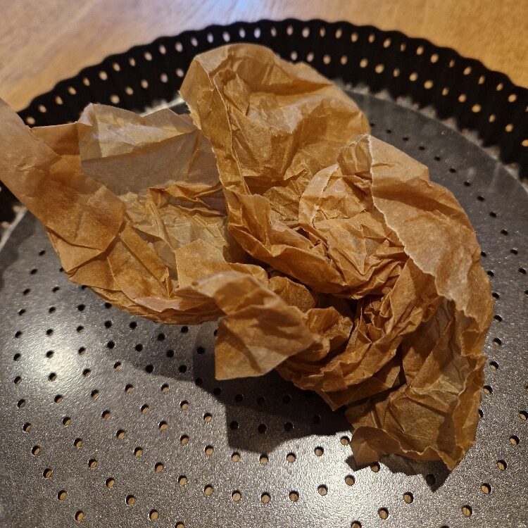Scrunching baking paper
