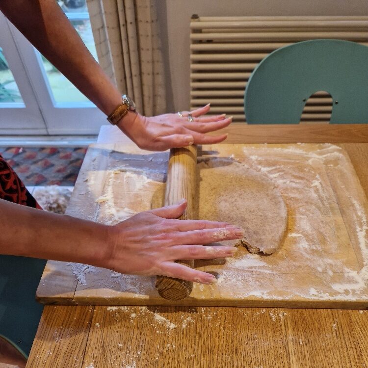 Emily rolling dough