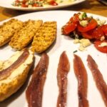 anchovy toasts with tomato salad