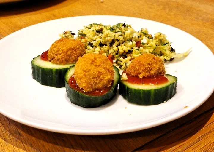 picnic eggs with cucumber slices on plate